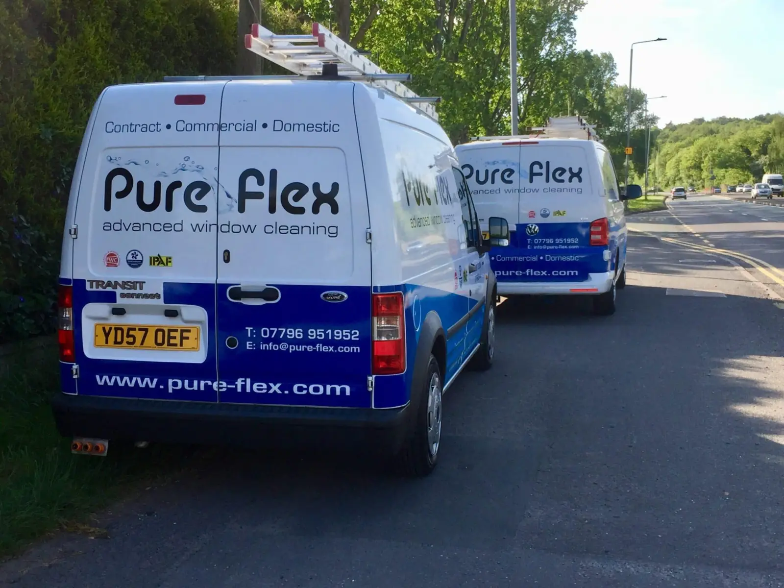 Two Pure Flex window cleaning vans on a job in Leicestershire